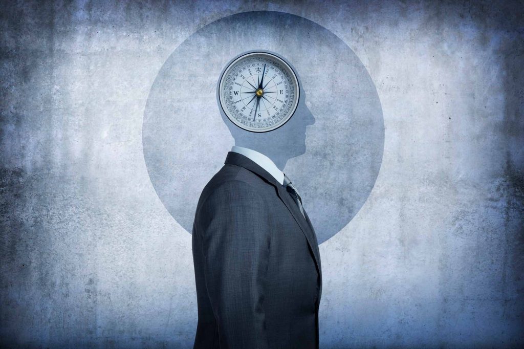 Illustration of a person with a compass over their head.